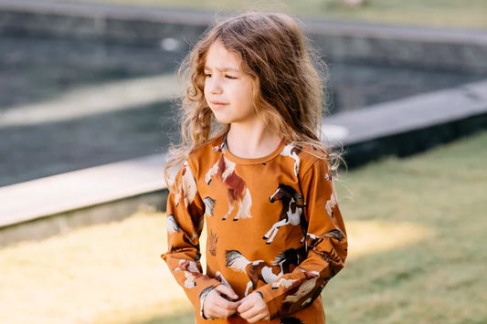 Nachhaltige Kinderkleidung: Warum sie wichtig ist und wie sie die Zukunft unserer Kinder und des Planeten beeinflusst?
